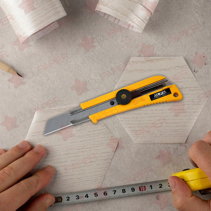 Cutter olfa L-2 con mango antideslizante ancho de 18 mm.